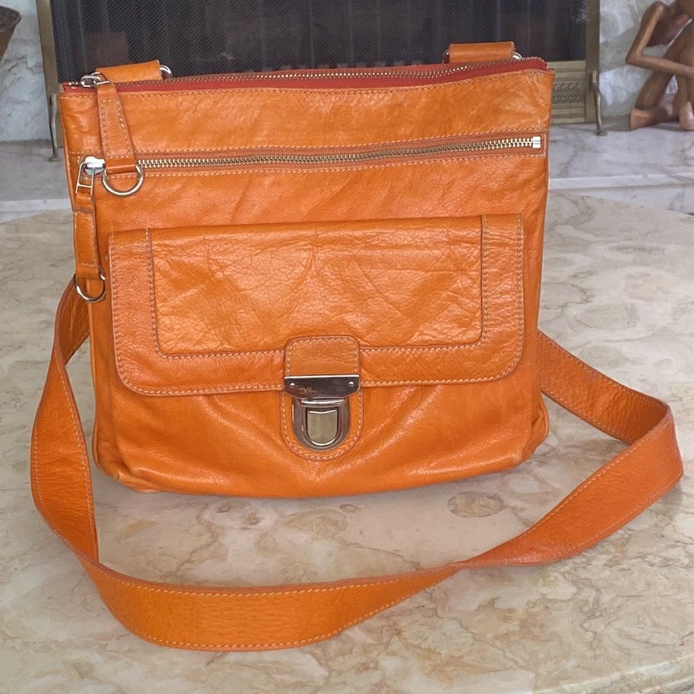 Roots Leather Side Saddle Cross Body Bag